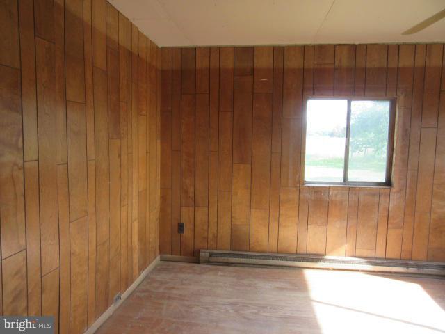 6203 Fooks Mill Road Rhodesdale, MD 21659 - Photo 5 of 11 a view of a door and wooden walls