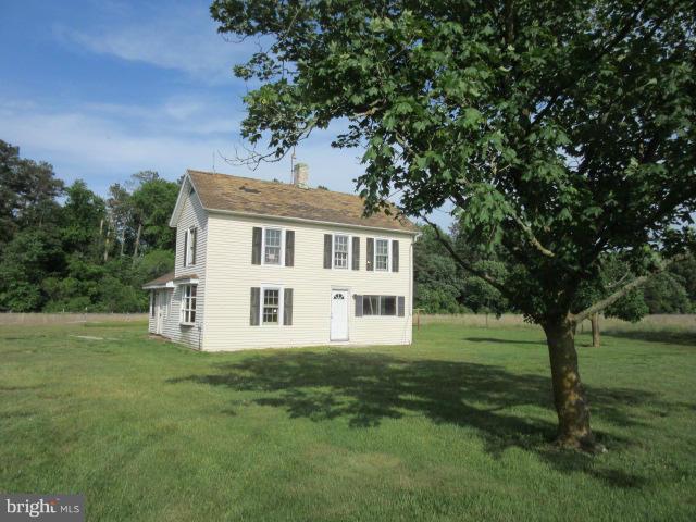6203 Fooks Mill Road Rhodesdale, MD 21659 - Photo 6 of 11 a house with trees in the background