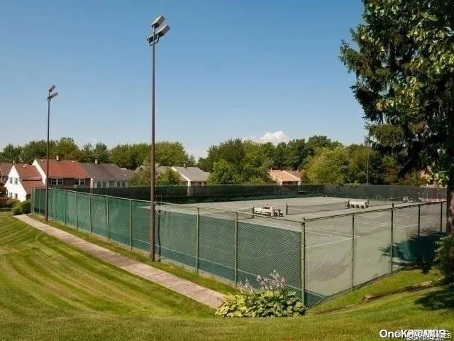 $920,000 | 95 Woodlake Drive West, Unit 95, Woodbury, NY 11797