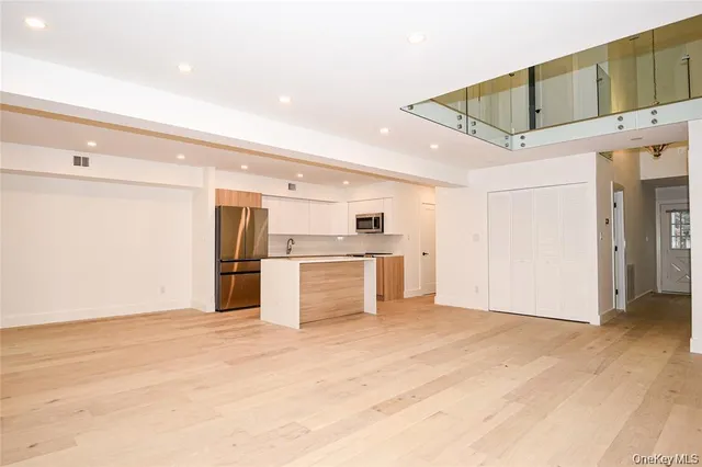 a view of a kitchen with a sink