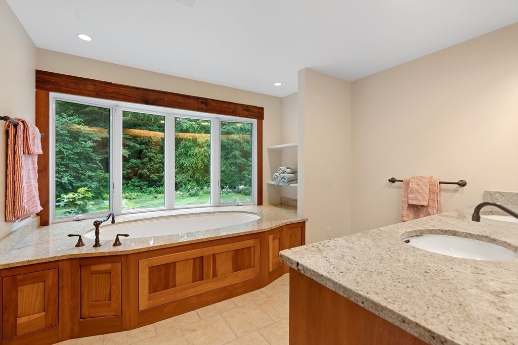 50 3 Ponds Road Wayland, MA 01778 - Photo 19 of 32 a kitchen with a sink and a window