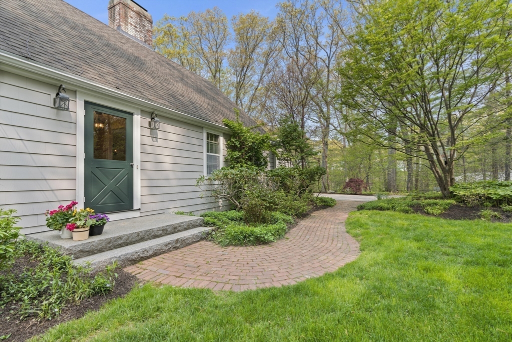 50 3 Ponds Road Wayland, MA 01778 - Photo 28 of 32 a view of a back yard of the house