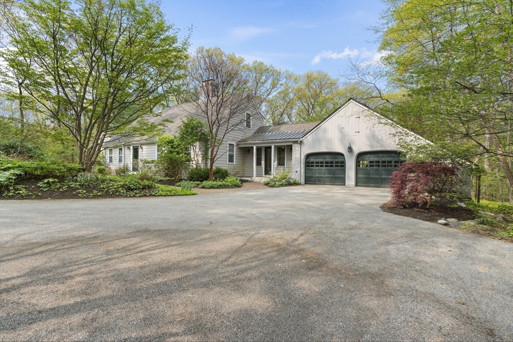 50 3 Ponds Road Wayland, MA 01778 - Photo 32 of 32 a view of house with a yard and potted plants