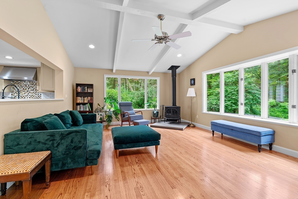 50 3 Ponds Road Wayland, MA 01778 - Photo 7 of 32 a living room with furniture and a large window