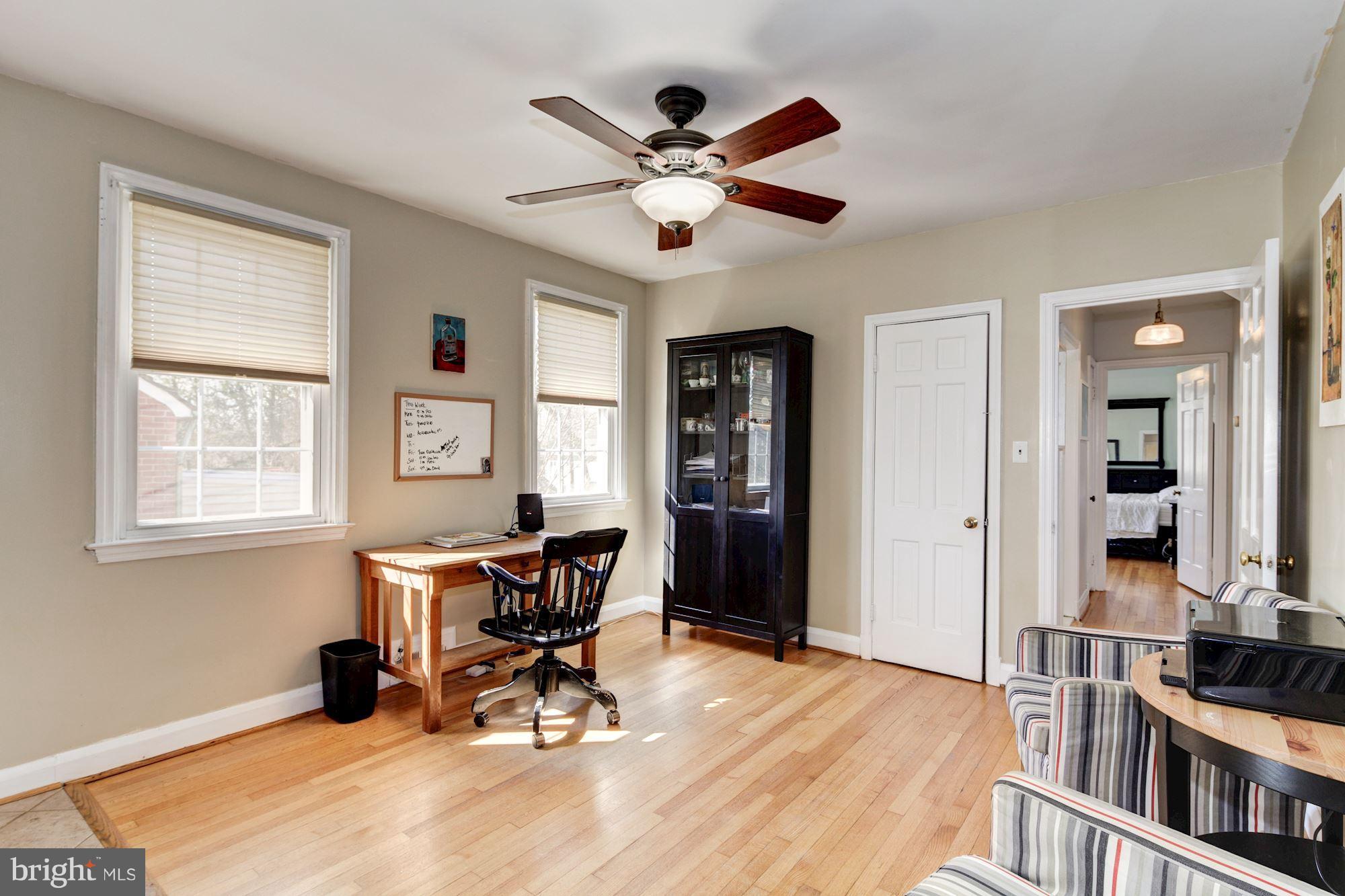 6722 Sherwood Road Baltimore, MD 21239 - Photo 14 of 30 a work room with furniture and windows