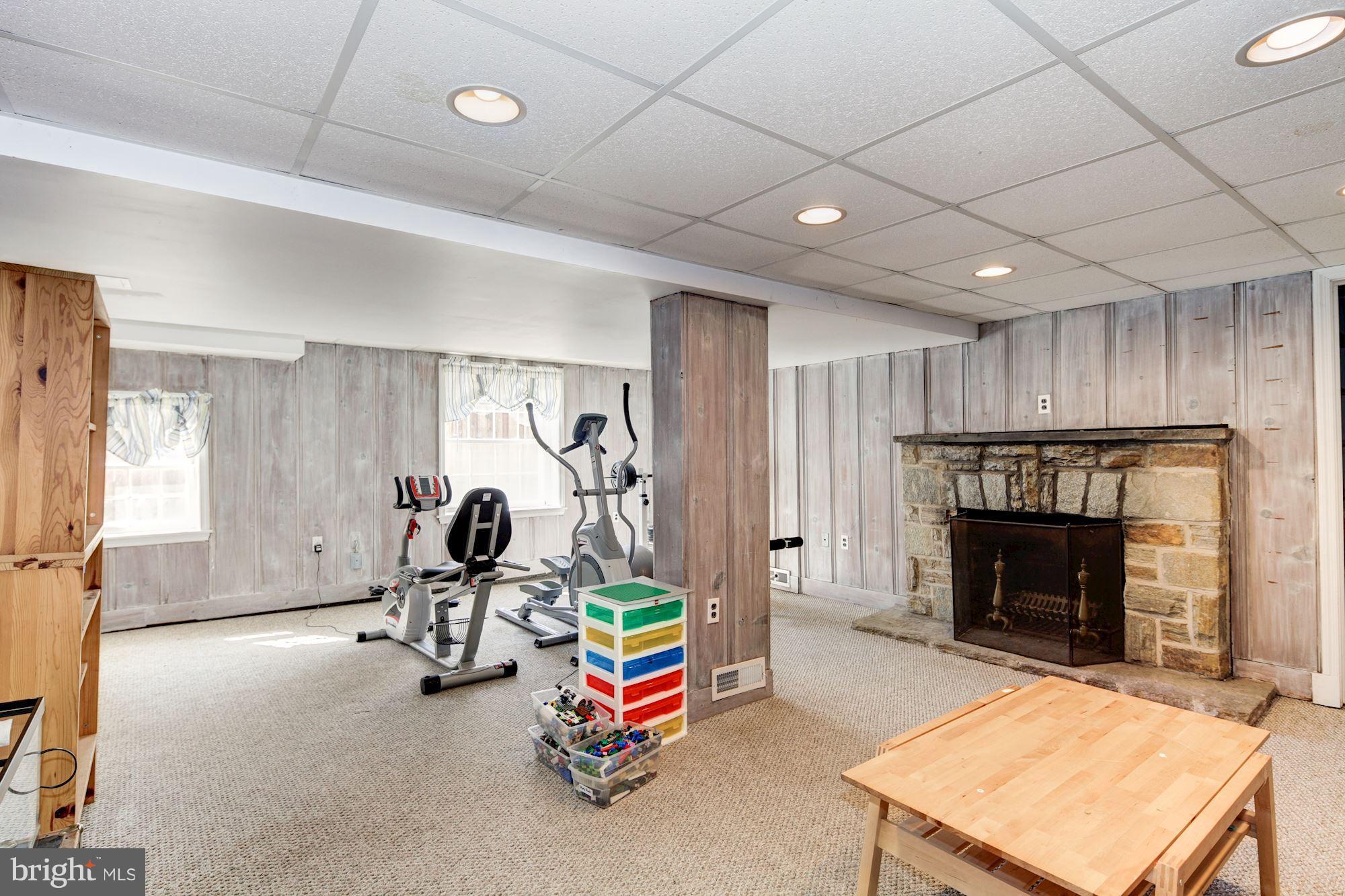 6722 Sherwood Road Baltimore, MD 21239 - Photo 25 of 30 a view of a room with gym equipment
