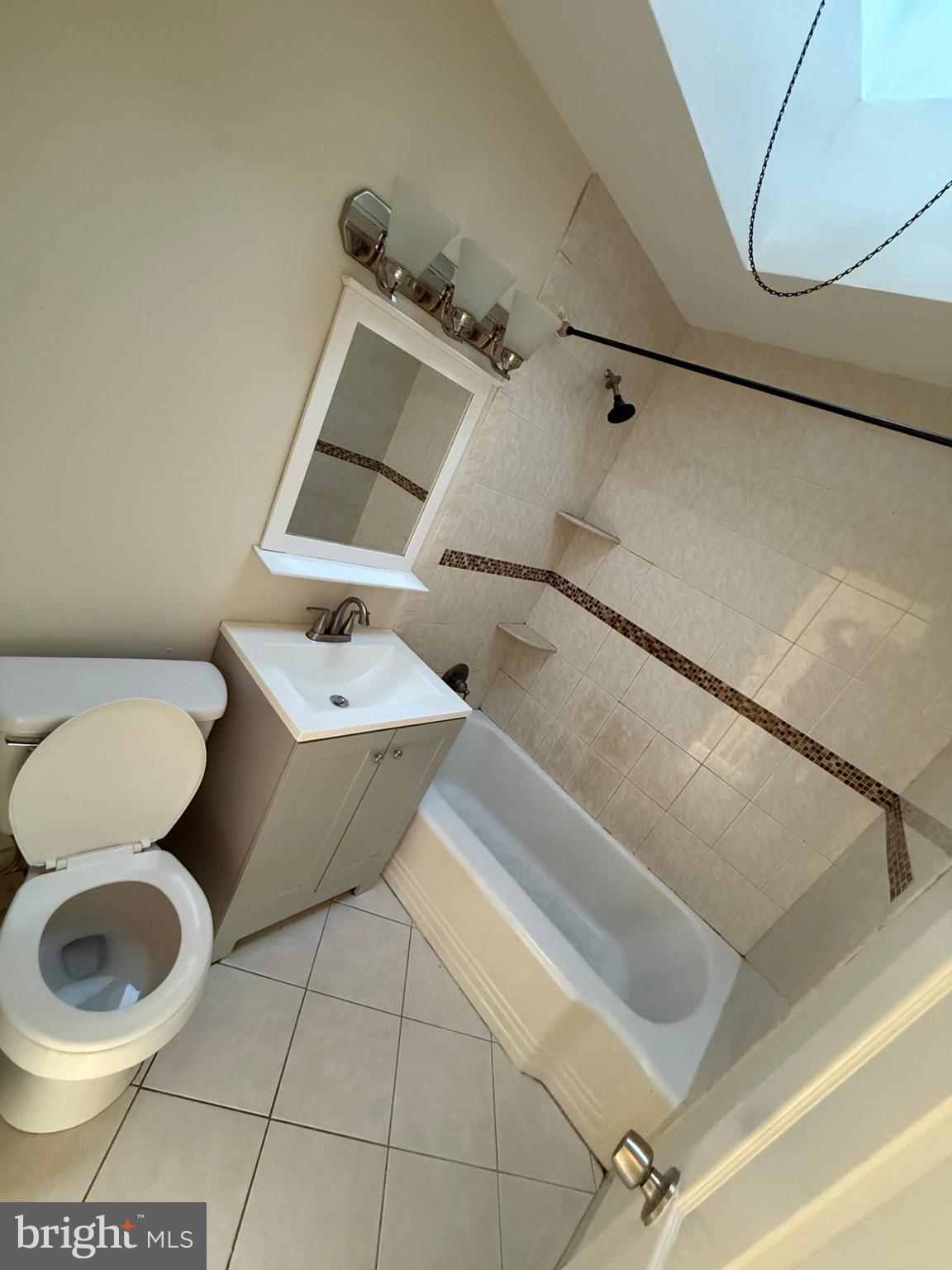 4434 Marple Street Philadelphia, PA 19136 - Photo 4 of 7 a bathroom with a toilet and a sink