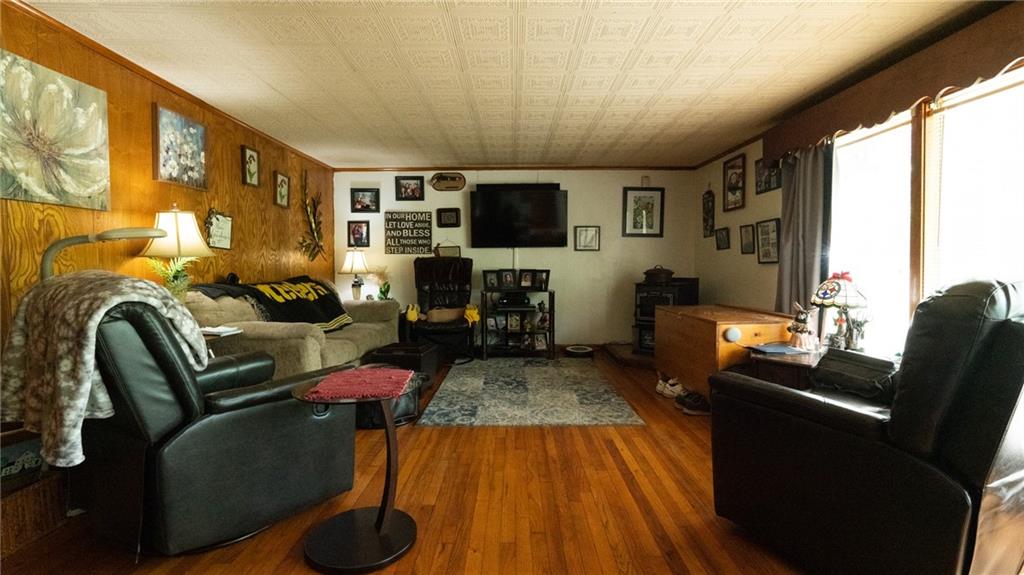 1049 Branchton Road Boyers, PA 16020 - Photo 2 of 22 a living room with furniture or flat screen tv and a fireplace