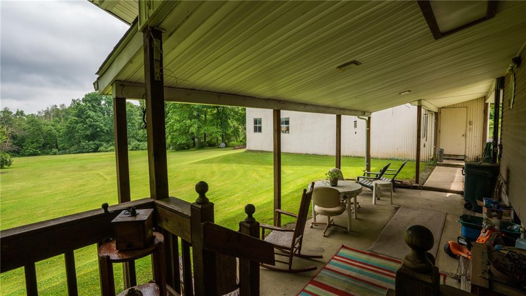1049 Branchton Road Boyers, PA 16020 - Photo 15 of 22 a view of swimming pool with outdoor seating