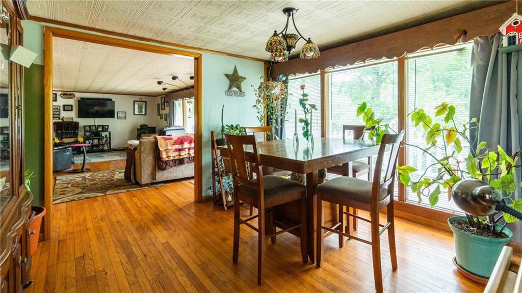 1049 Branchton Road Boyers, PA 16020 - Photo 5 of 22 a view of a dining room with furniture window and wooden floor