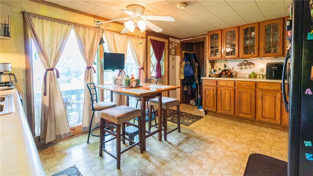 1049 Branchton Road Boyers, PA 16020 - Photo 7 of 22 a view of a dining room with furniture window and wooden floor