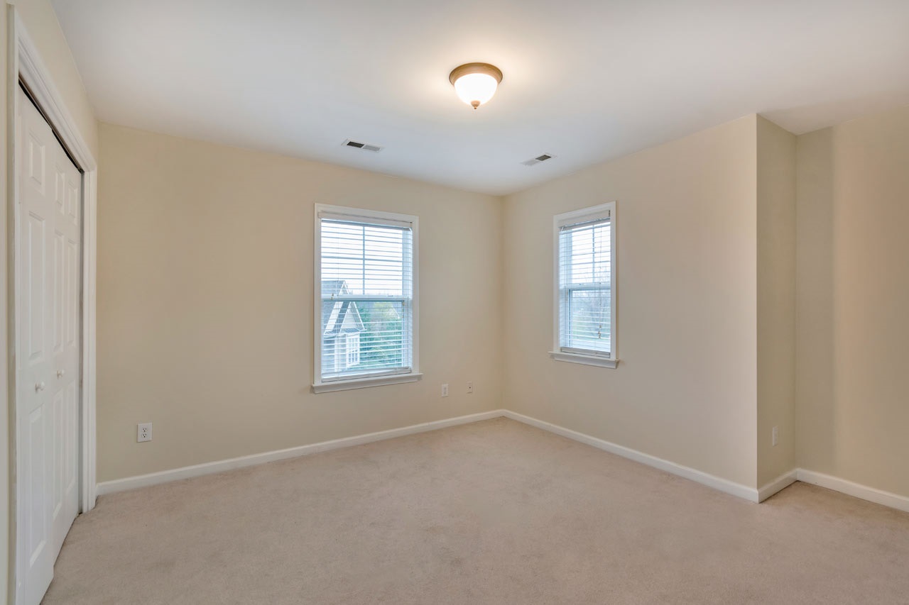 1319 Stoney Ridge Road Charlottesville, VA 22902 - Photo 11 of 17 an empty room with a window