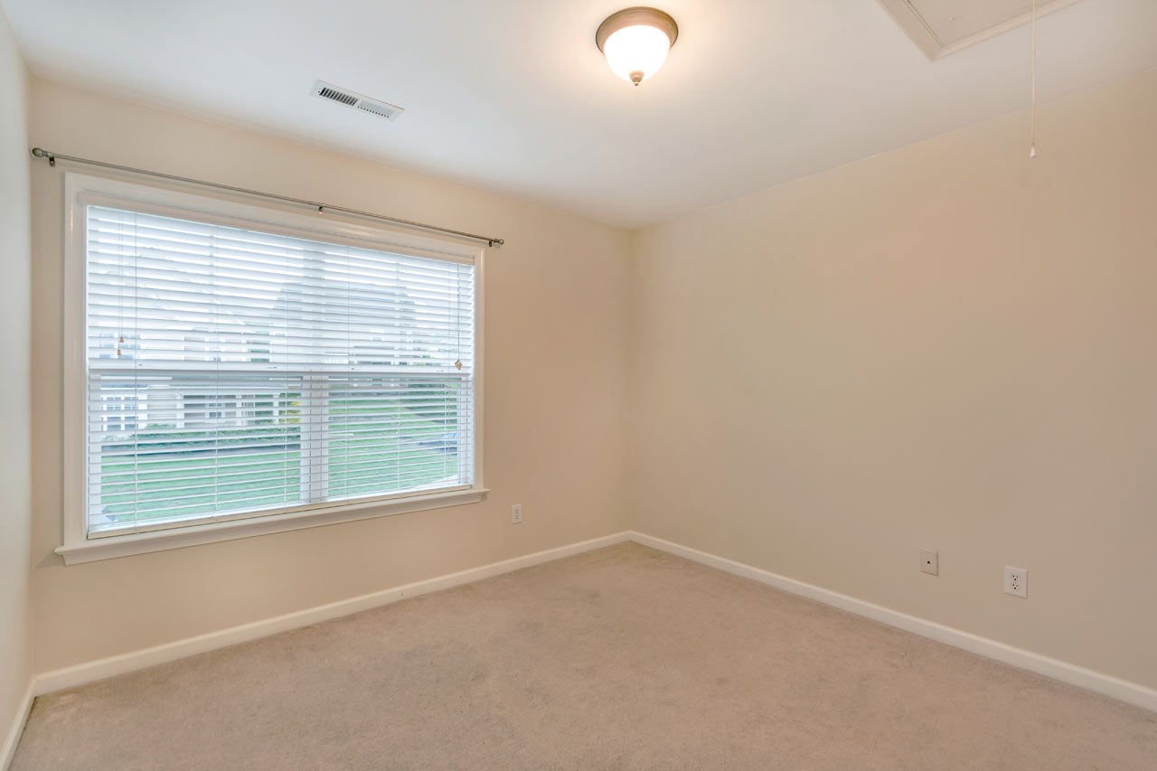 1319 Stoney Ridge Road Charlottesville, VA 22902 - Photo 12 of 17 an empty room with a window