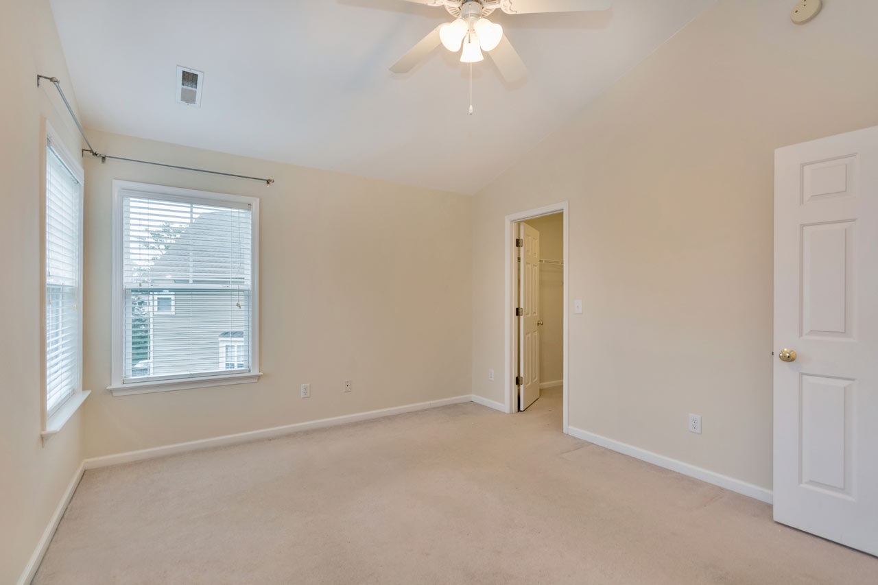 1319 Stoney Ridge Road Charlottesville, VA 22902 - Photo 9 of 17 an empty room with windows and closet