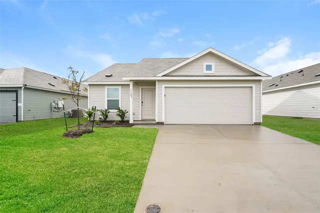 a front view of house with yard