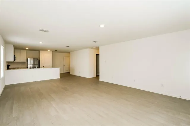 a view of a kitchen with a sink