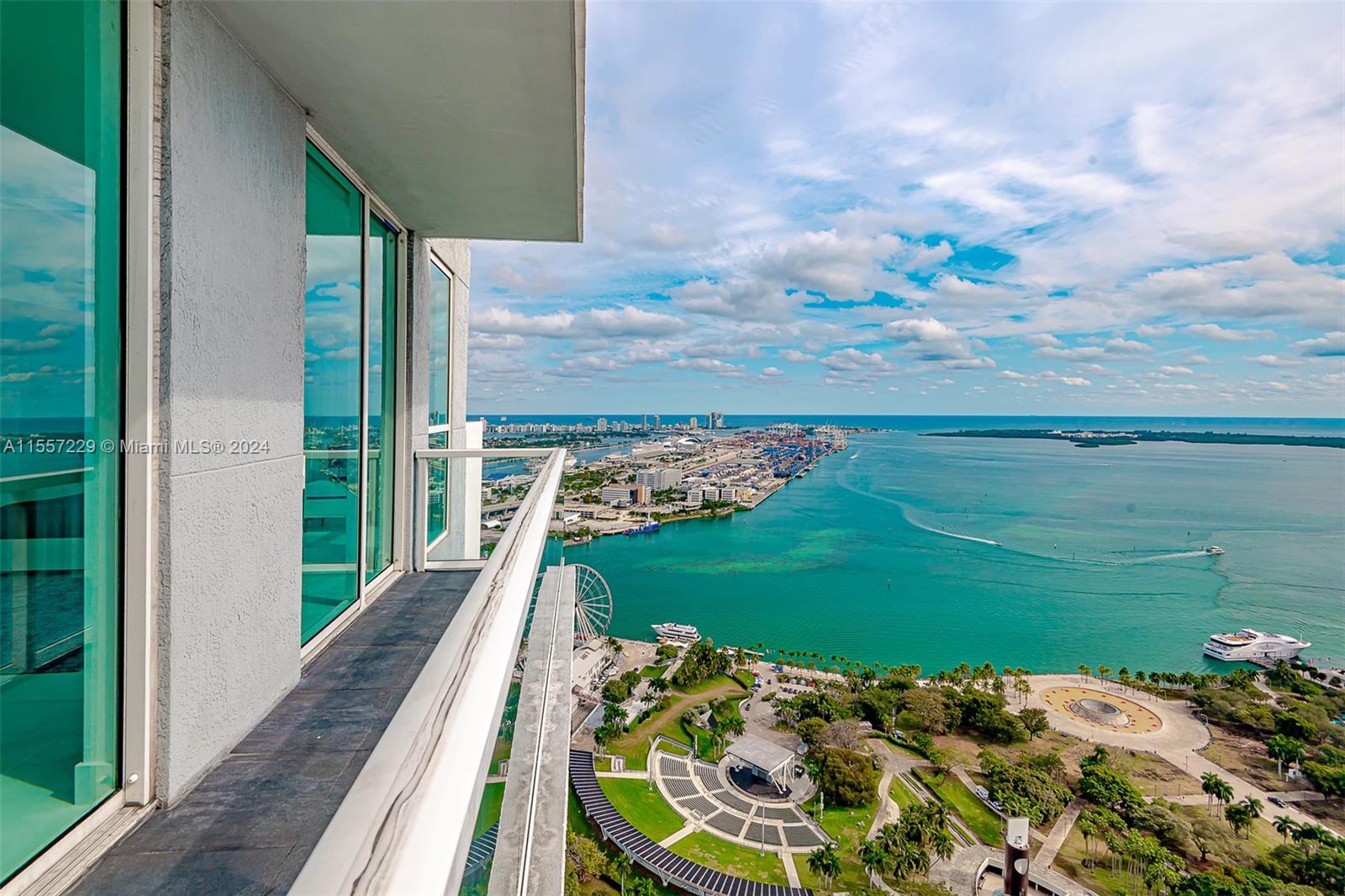 a view of a balcony with an ocean