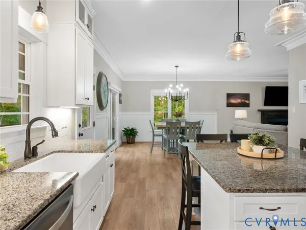 a bathroom with a double vanity sink and mirror