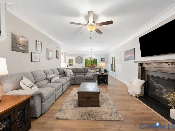 a large kitchen with a table and chairs in it