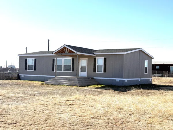 a view of a house with a swimming pool