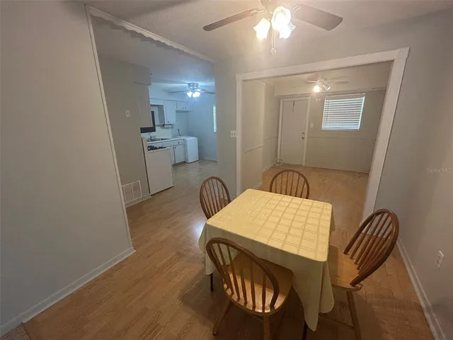 a workspace with furniture and window