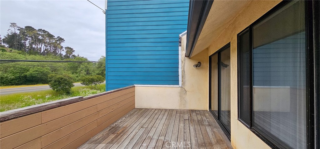 786 Main Street Cambria, CA 93428 - Photo 16 of 36 a view of a balcony with wooden floor