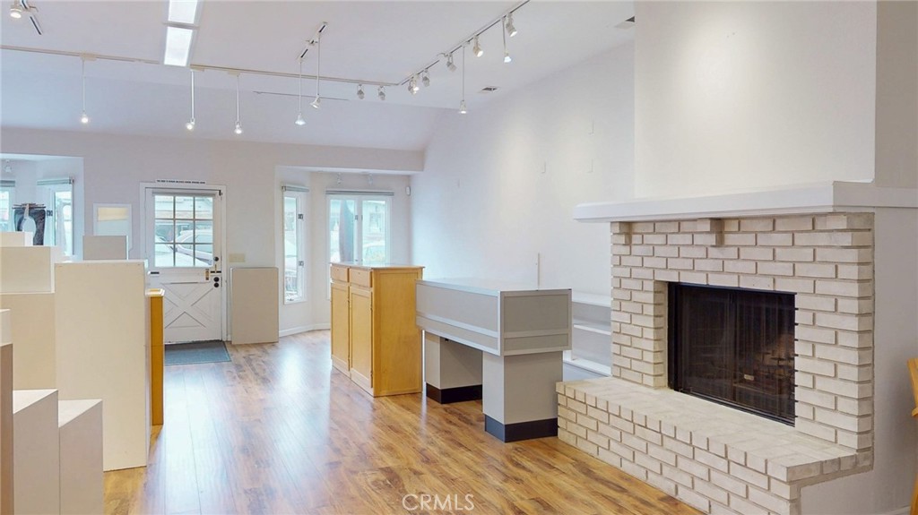 786 Main Street Cambria, CA 93428 - Photo 23 of 36 a living room with furniture and a fireplace