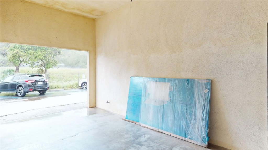 786 Main Street Cambria, CA 93428 - Photo 30 of 36 a view of a car park from a hallway