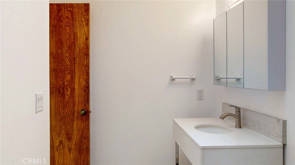 786 Main Street Cambria, CA 93428 - Photo 8 of 36 a bathroom with a sink and vanity