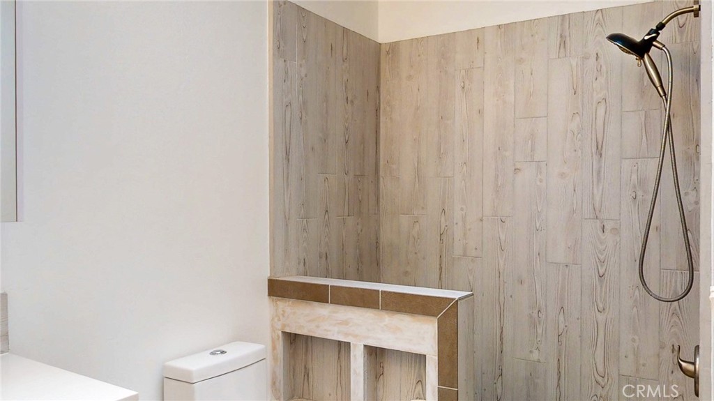 786 Main Street Cambria, CA 93428 - Photo 9 of 36 a bathroom with a shower curtain and a shower curtain