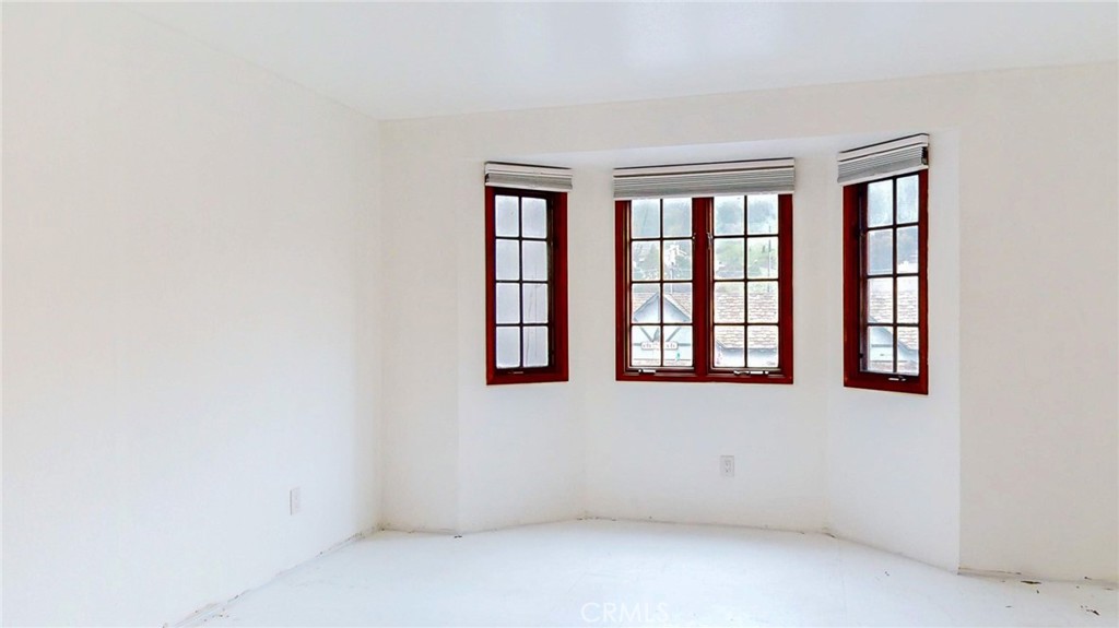 786 Main Street Cambria, CA 93428 - Photo 10 of 36 an empty room with windows
