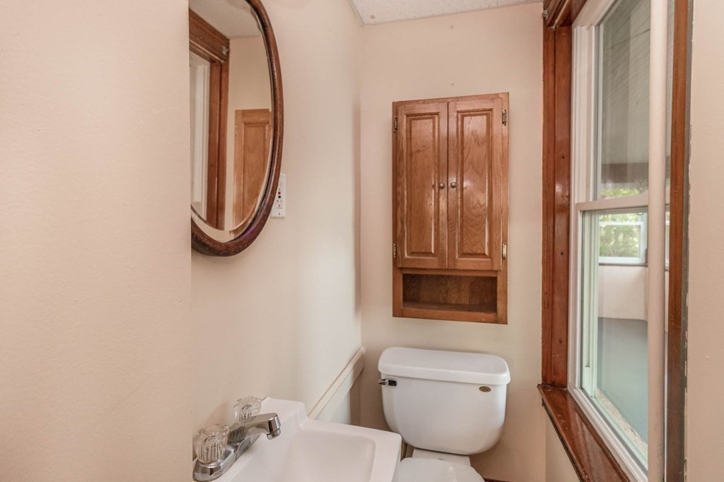 91 Edgewater Road Hull, MA 02045 - Photo 17 of 41 a bathroom with a toilet and a shower