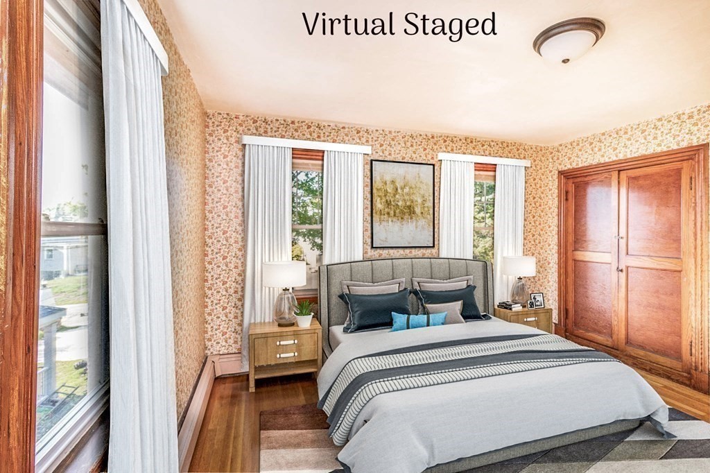 91 Edgewater Road Hull, MA 02045 - Photo 20 of 41 a bedroom with a bed and a window