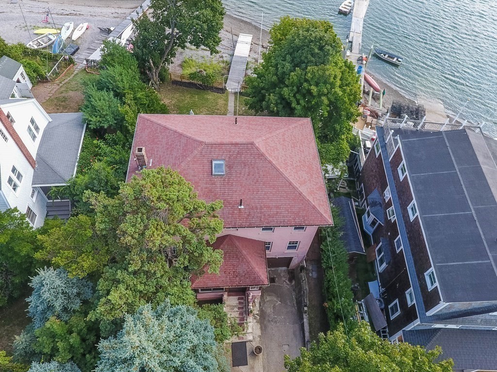 91 Edgewater Road Hull, MA 02045 - Photo 30 of 41 an aerial view of a house with an outdoor space and seating