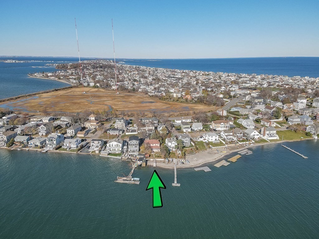91 Edgewater Road Hull, MA 02045 - Photo 3 of 41 an aerial view of ocean and residential houses with outdoor space
