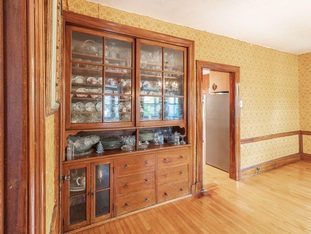 91 Edgewater Road Hull, MA 02045 - Photo 32 of 41 a bathroom with a granite countertop sink and a mirror