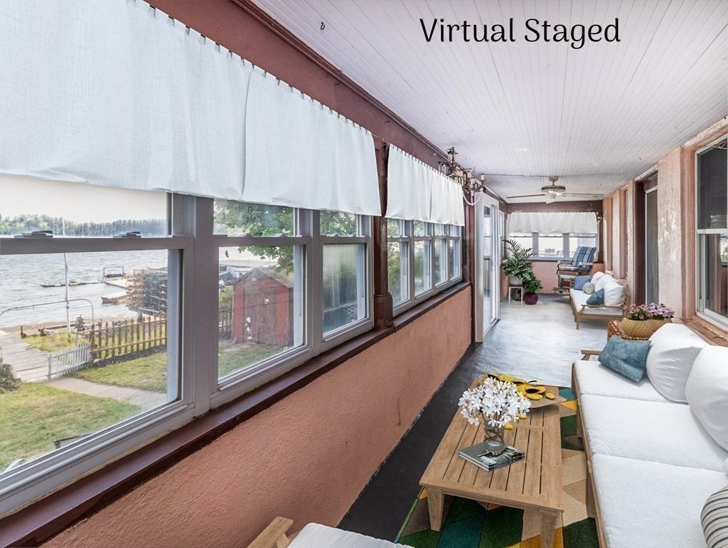 91 Edgewater Road Hull, MA 02045 - Photo 33 of 41 a living room with furniture and a large window