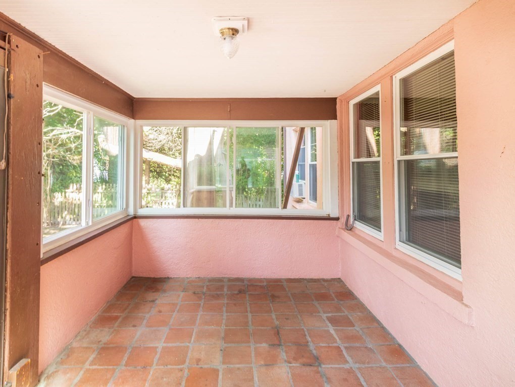 91 Edgewater Road Hull, MA 02045 - Photo 7 of 41 a view of an empty room with a window