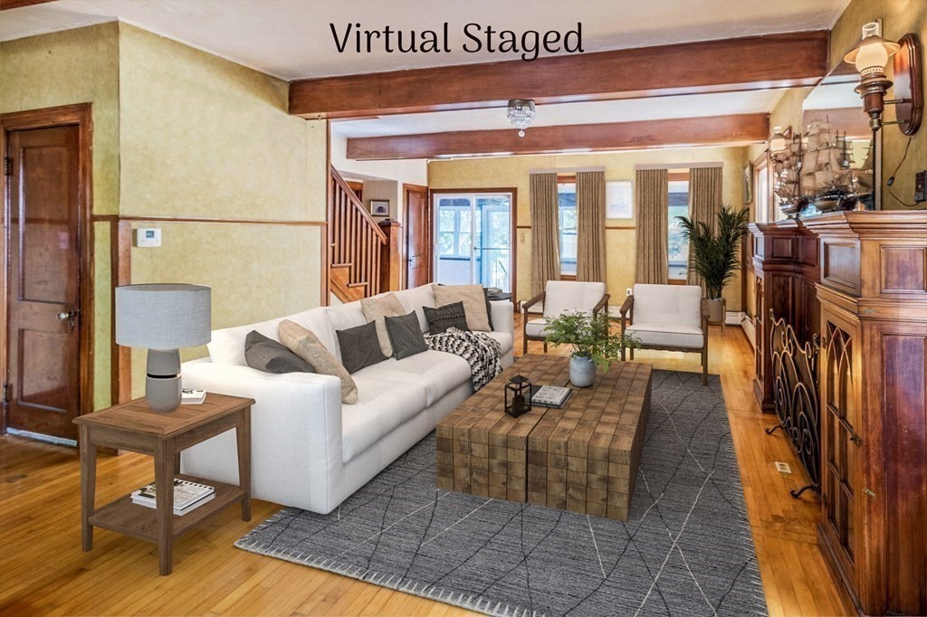 91 Edgewater Road Hull, MA 02045 - Photo 8 of 41 a living room with furniture and a window
