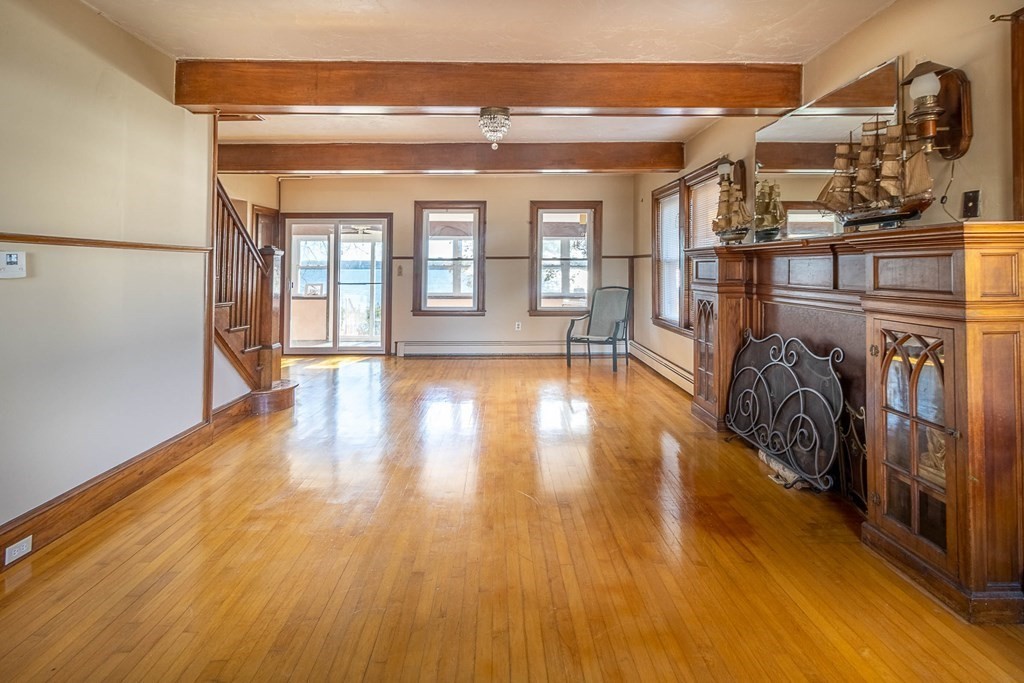 91 Edgewater Road Hull, MA 02045 - Photo 9 of 41 a view of entryway with wooden floor