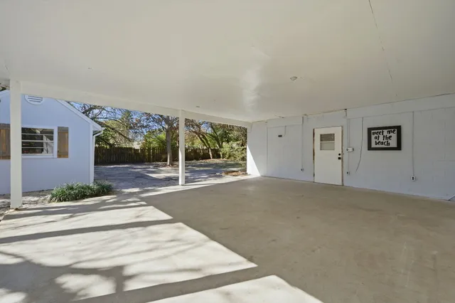 a view of a room with a garage
