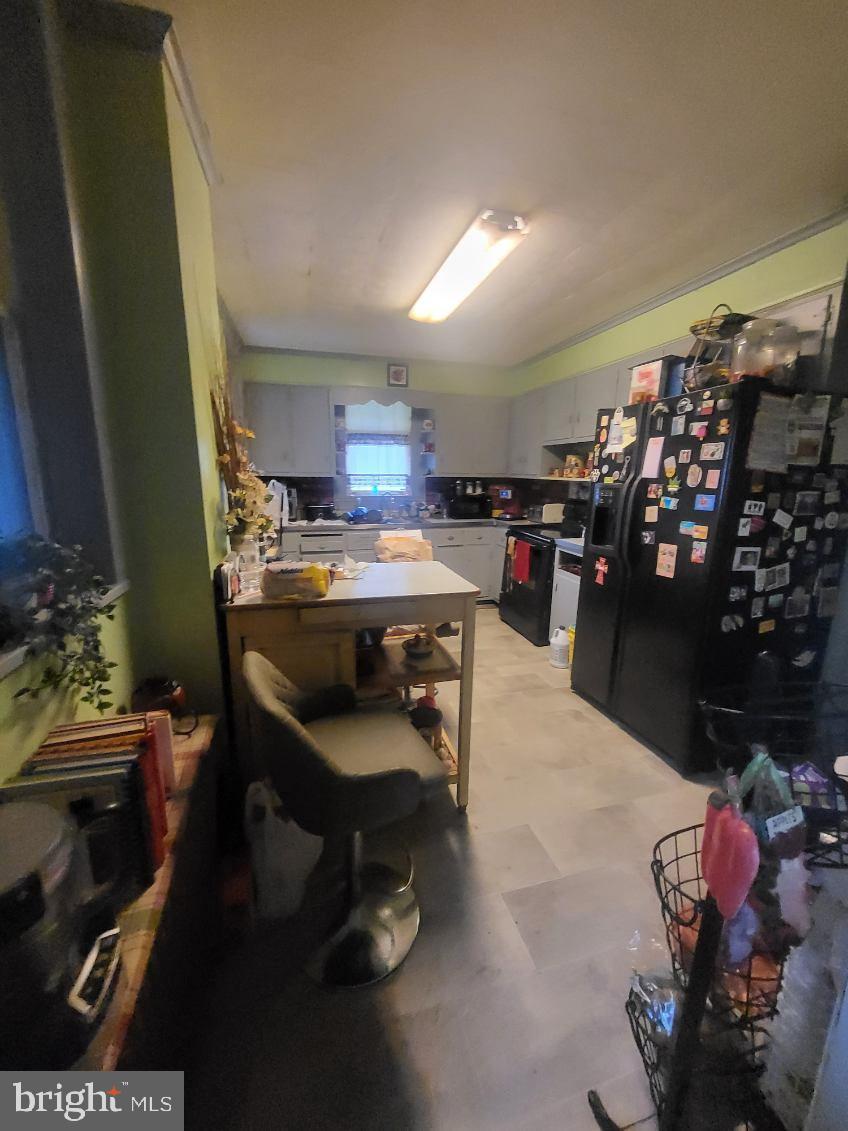 413 Delaware Street Monessen, PA 15062 - Photo 10 of 19 Cozy kitchen with vibrant green accents.