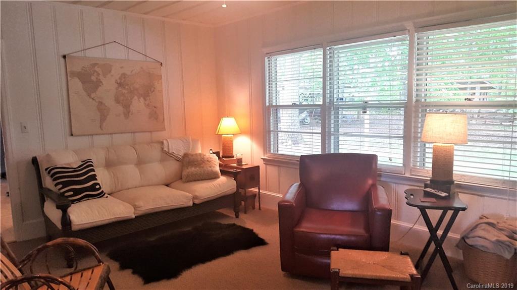 1654 Prince Road Columbus, NC 28722 - Photo 11 of 29 a living room with furniture and a large window