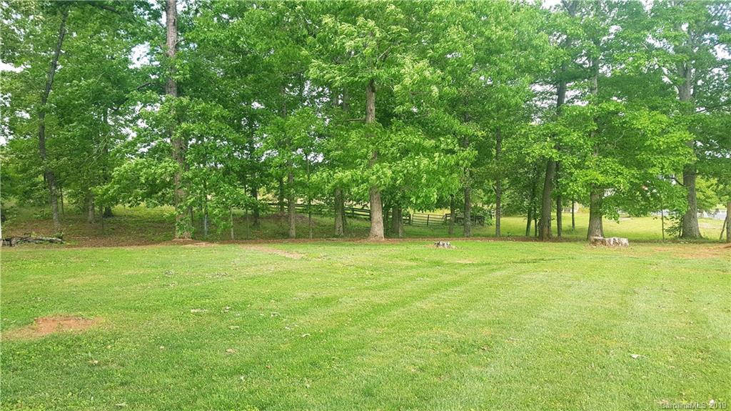 1654 Prince Road Columbus, NC 28722 - Photo 21 of 29 a view of outdoor space with deck and yard