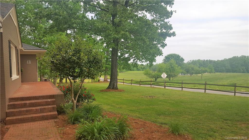1654 Prince Road Columbus, NC 28722 - Photo 26 of 29 a view of outdoor space with deck and yard