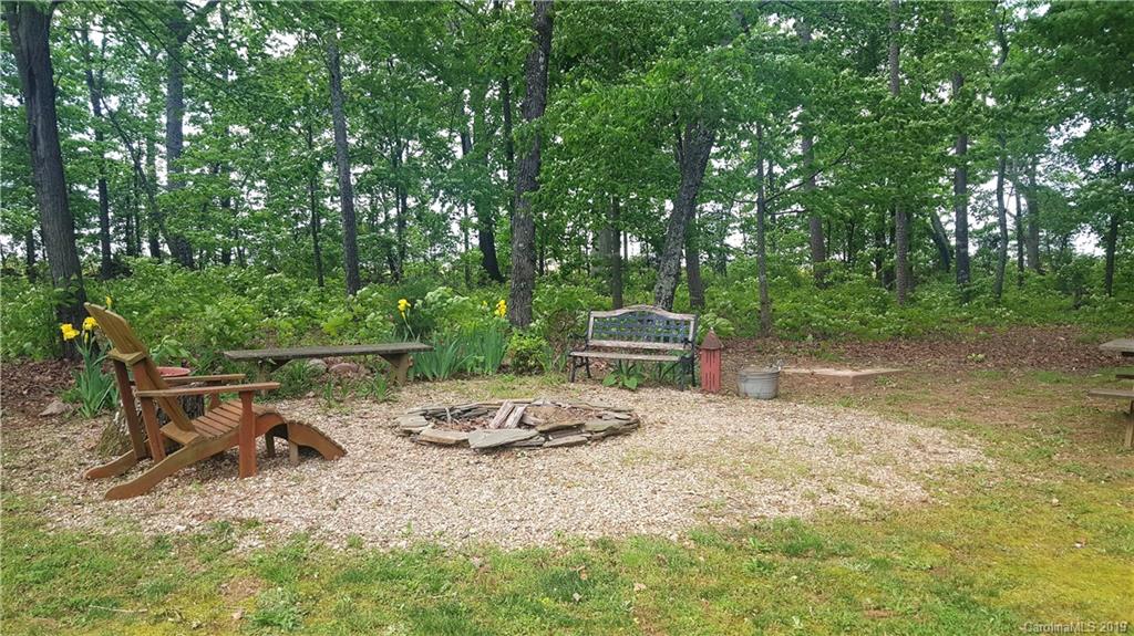 1654 Prince Road Columbus, NC 28722 - Photo 27 of 29 a view of backyard with wooden fence