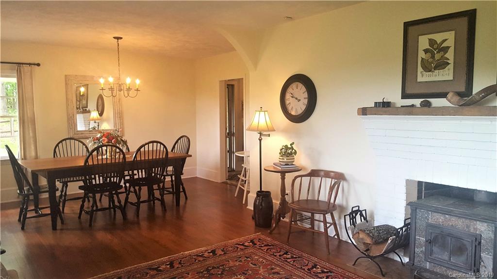 1654 Prince Road Columbus, NC 28722 - Photo 5 of 29 a view of a dining room with furniture and chandelier