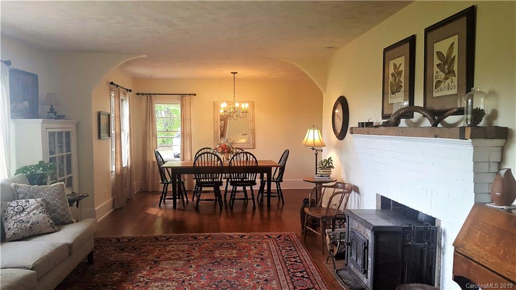 1654 Prince Road Columbus, NC 28722 - Photo 6 of 29 a view of a dining room with furniture and wooden floor