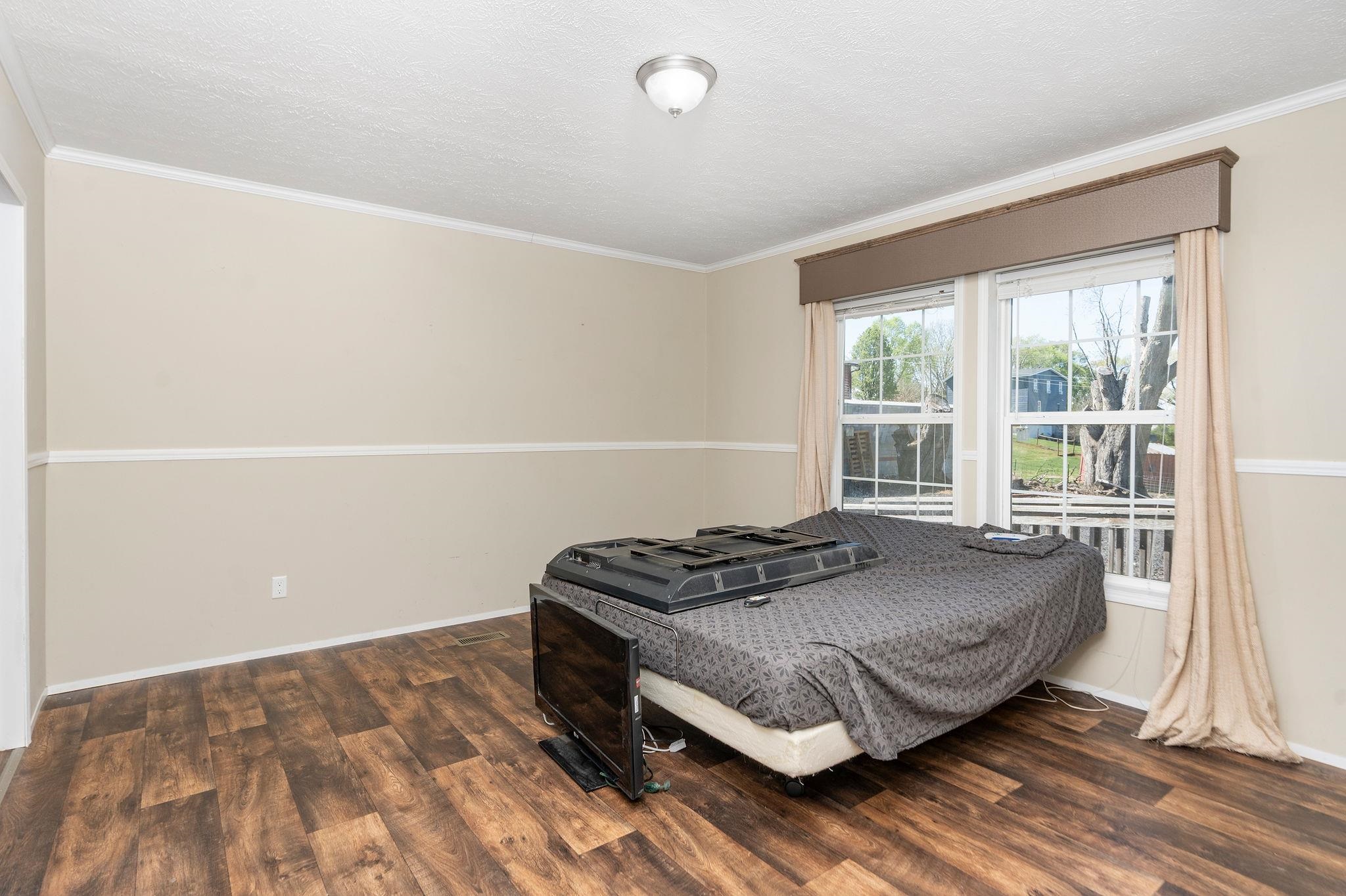 2061 Cecil Wampler Road Mount Crawford, VA 22841 - Photo 35 of 70 a bedroom with a bed and a window