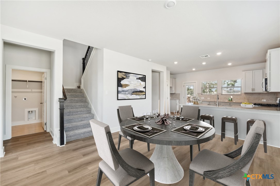 1543 Ravine Way New Braunfels, TX 78132 - Photo 5 of 28 Photo is not of the actual home, but is an inspirational photo of builder’s model home and may depict options, furnishings, and/or decorator features that are not included
